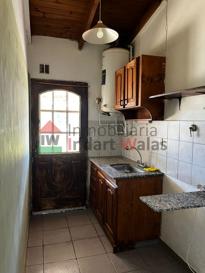 CASA DE BARRIO CON AMPLIACION