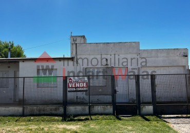 CASA DE BARRIO CON AMPLIACION
